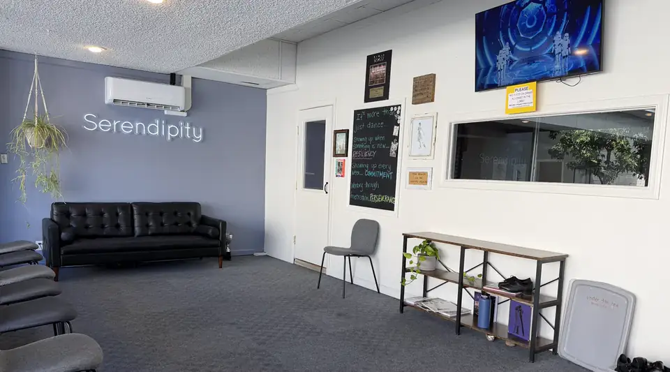 Serendipity lobby seating and a viewing window into the dance studio