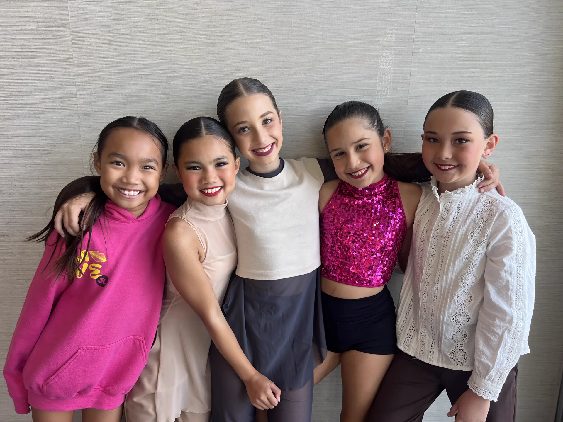 Serendipity dancers ages 8 to 11 smiling together